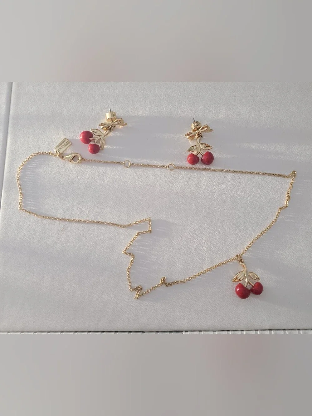 Coach Gold-Tone Cherry Necklace and Earrings - Red